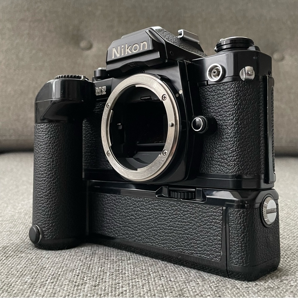 [SOLD] Nikon FM2n Black 35mm SLR Film Camera Body And MD-12 Motor Drive
